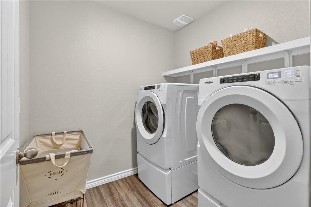 1126 Carnaby Street Corpus Christi, TX 78415 - Photo 19 of 39 a utility room with dryer and washer