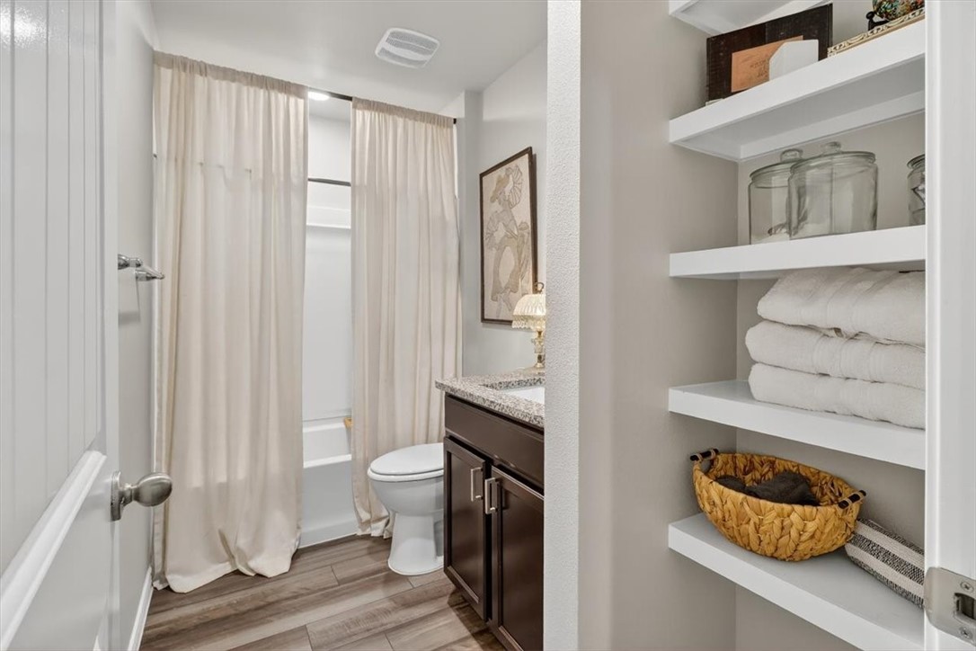 1126 Carnaby Street Corpus Christi, TX 78415 - Photo 29 of 39 a bathroom with a sink and a mirror