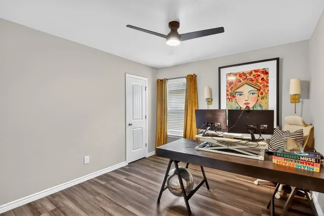 a workspace with furniture and a window