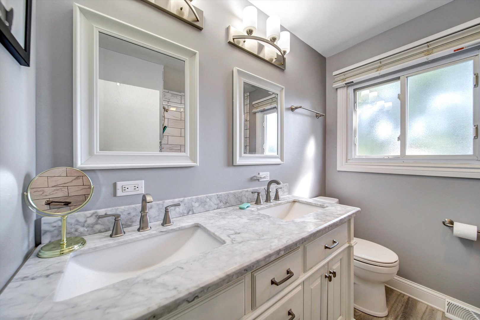 445 South Yale Avenue Addison, IL 60101 - Photo 11 of 20 a bathroom with a granite countertop sink a toilet and mirror