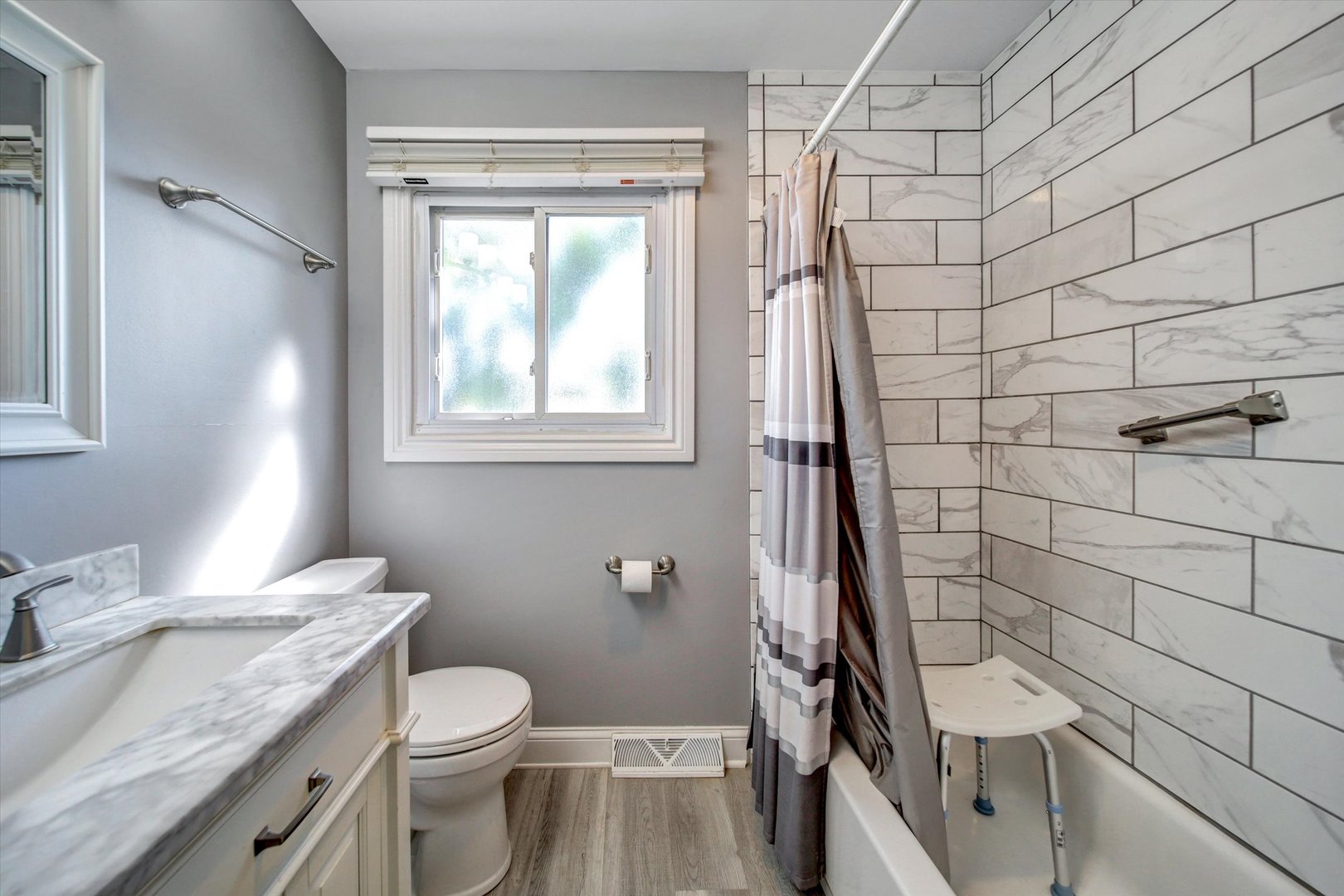 445 South Yale Avenue Addison, IL 60101 - Photo 12 of 20 a bathroom with a granite countertop sink toilet and shower