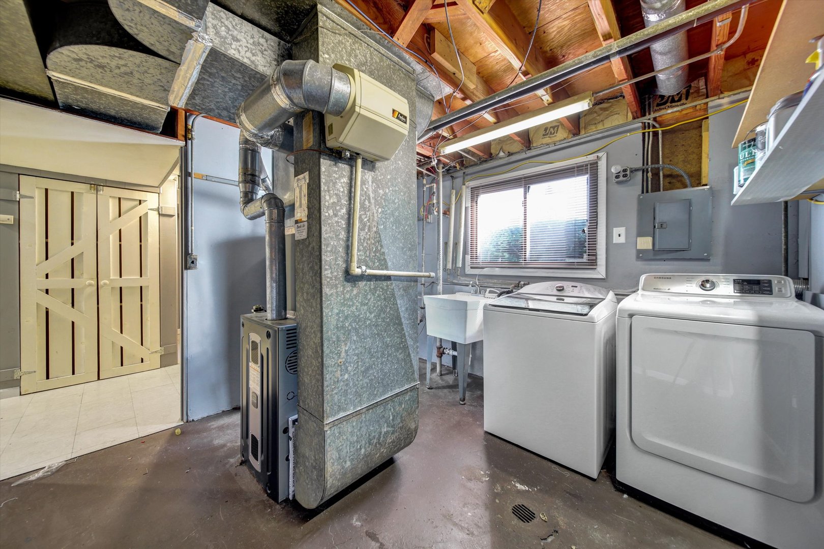 445 South Yale Avenue Addison, IL 60101 - Photo 17 of 20 a view of storage and utility room with washer and dryer