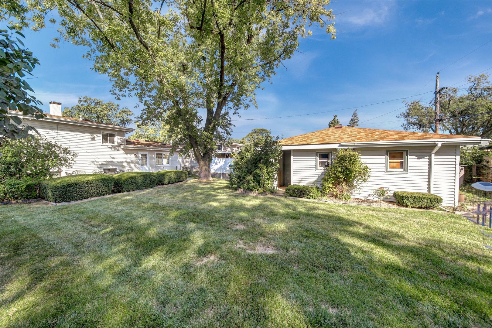 445 South Yale Avenue Addison, IL 60101 - Photo 19 of 20 front view of a house with a big yard