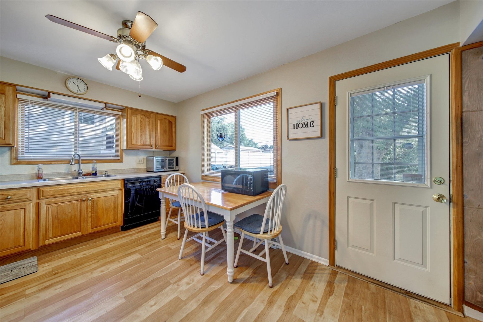 445 South Yale Avenue Addison, IL 60101 - Photo 5 of 20 a view of a dining room with furniture window and wooden floor