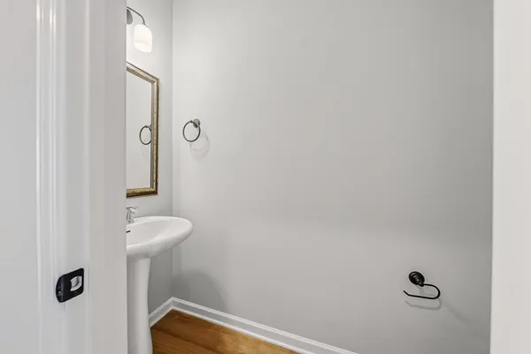 a view of a hallway with closet and entryway