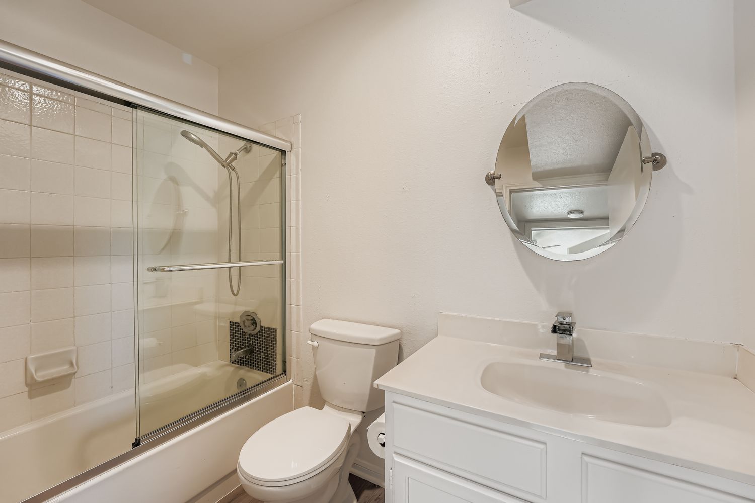 2450 Wickersham Lane, Unit 604 Austin, TX 78741 - Photo 19 of 22 a bathroom with a sink toilet and shower