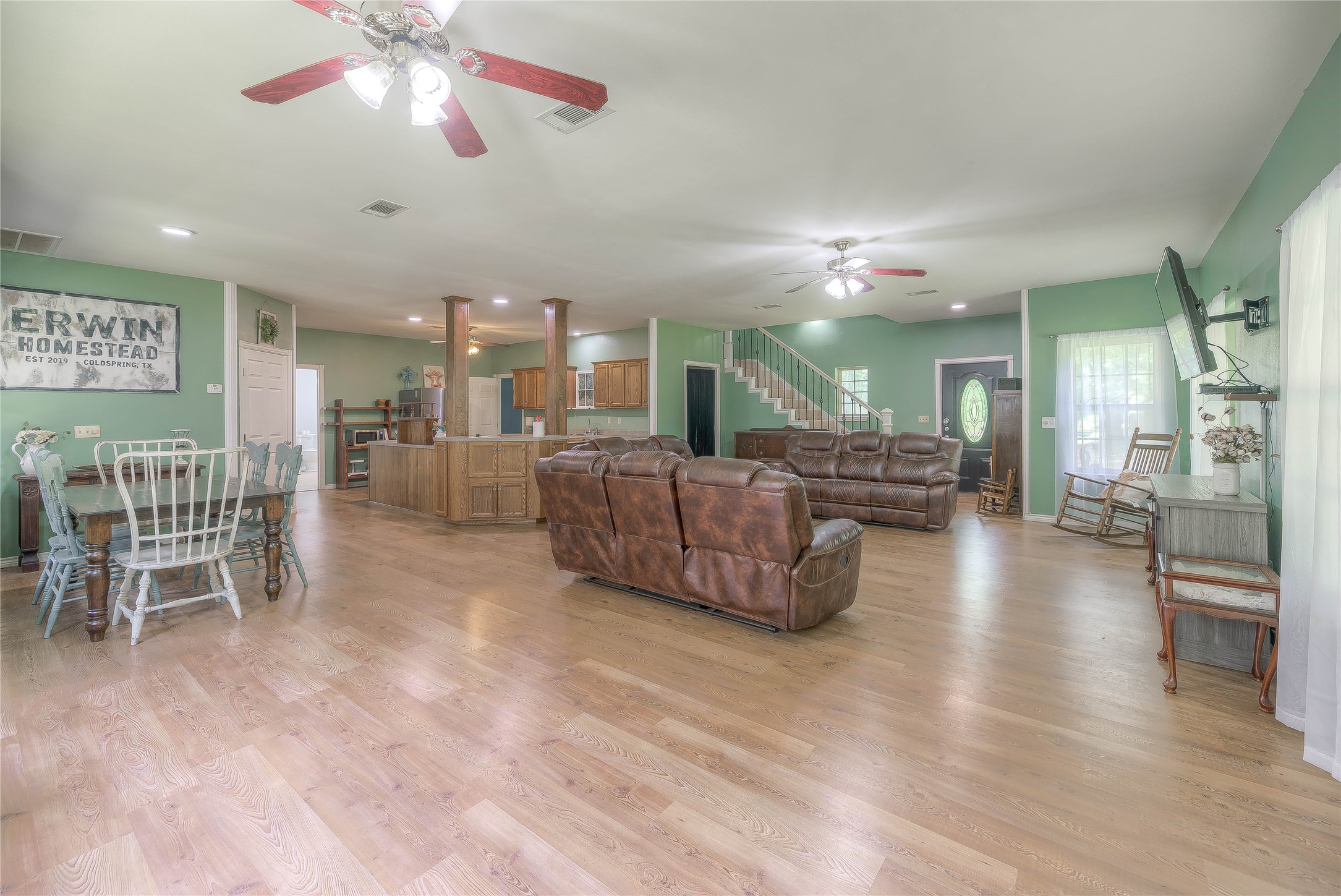 110 Happy Trails Road Coldspring, TX 77331 - Photo 3 of 49 Spacious living area open to kitchen and dining area for entertaining a crowd!