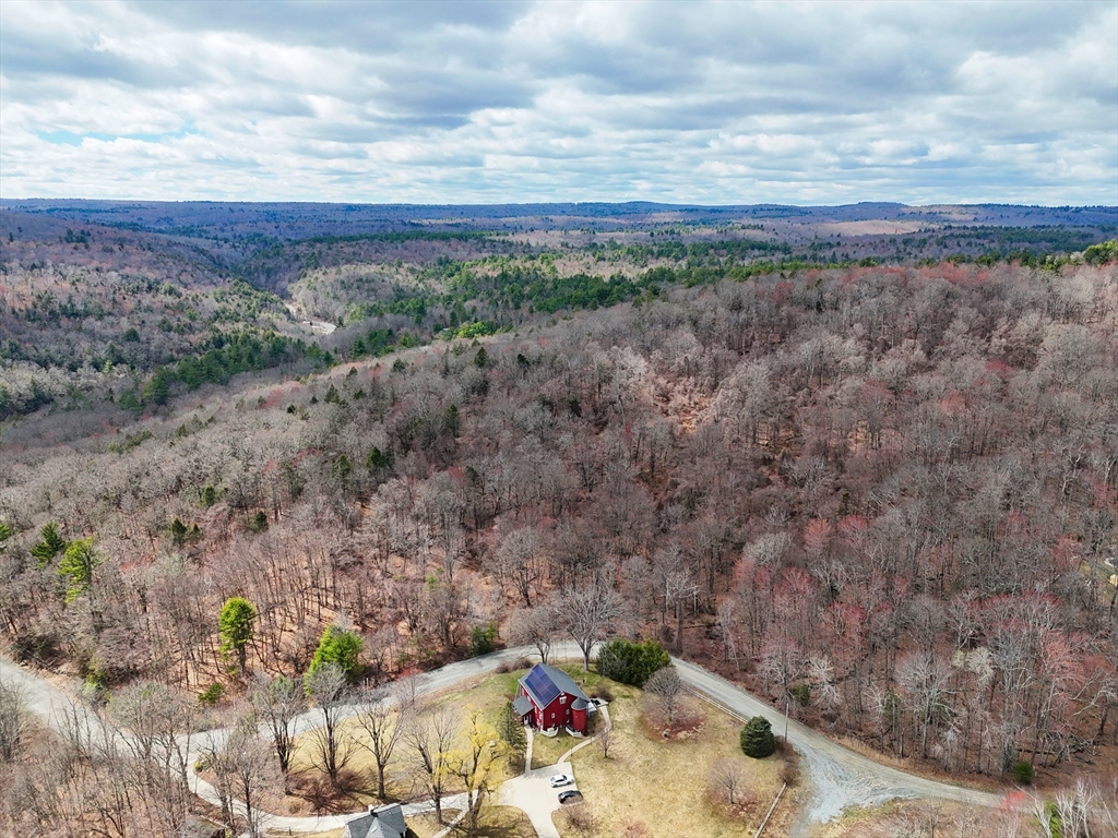 Lot 33.03 William Holmes Road Becket, MA 01223 - Photo 3 of 17 a view of a backyard with large trees