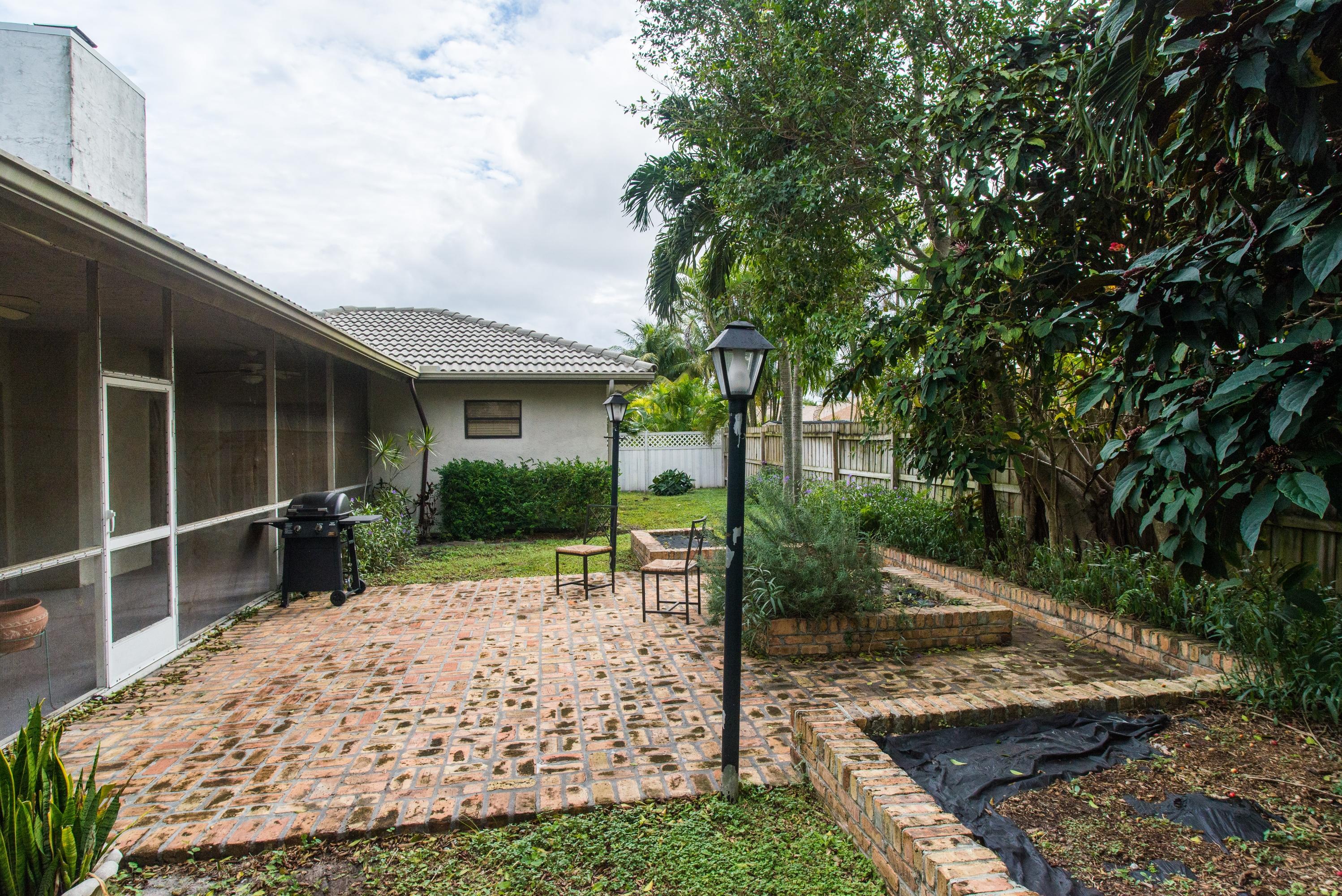 17746 Woodview Terrace Boca Raton, FL 33487 - Photo 34 of 44 backyard long
