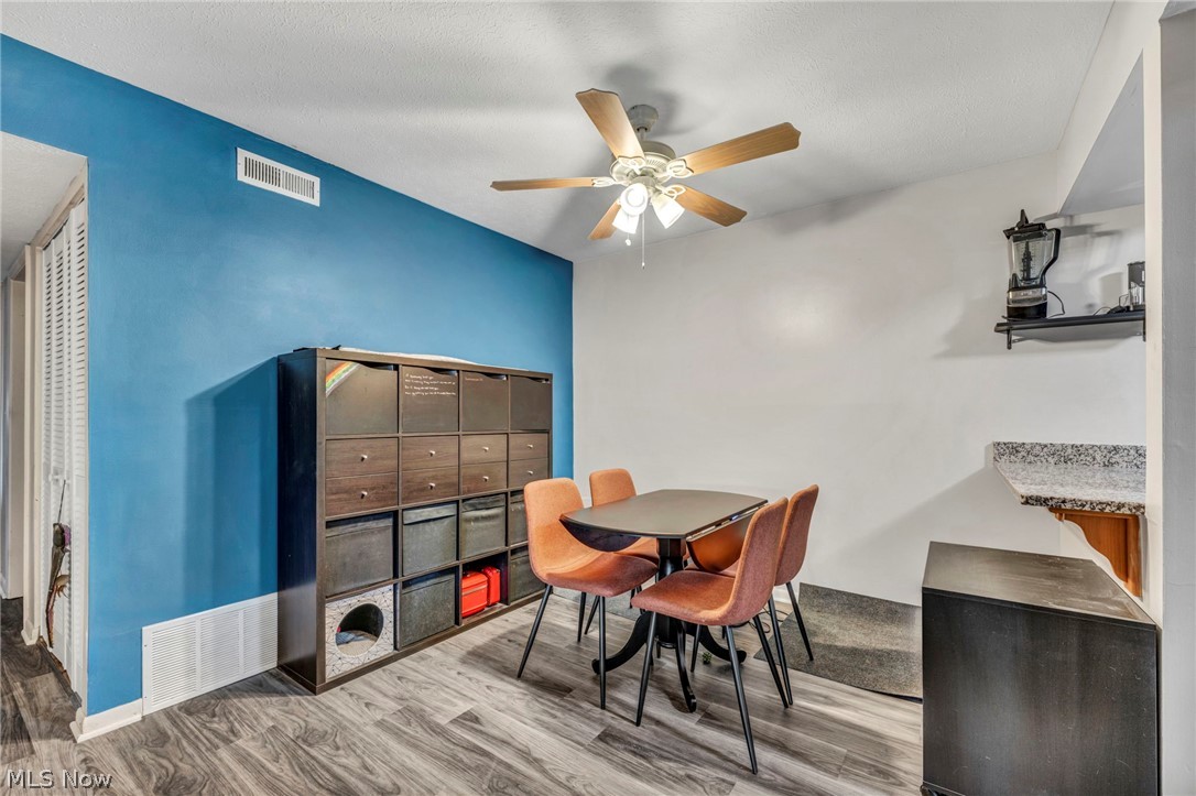 22952 Mastick Road, Unit 203 Cleveland, OH 44126 - Photo 13 of 35 Dining space with hardwood / wood-style floors and ceiling fan
