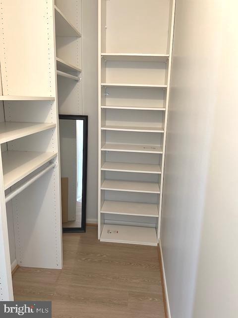 5101 River Road, Unit 601 Bethesda, MD 20816 - Photo 20 of 38 primary bedroom walk in closet