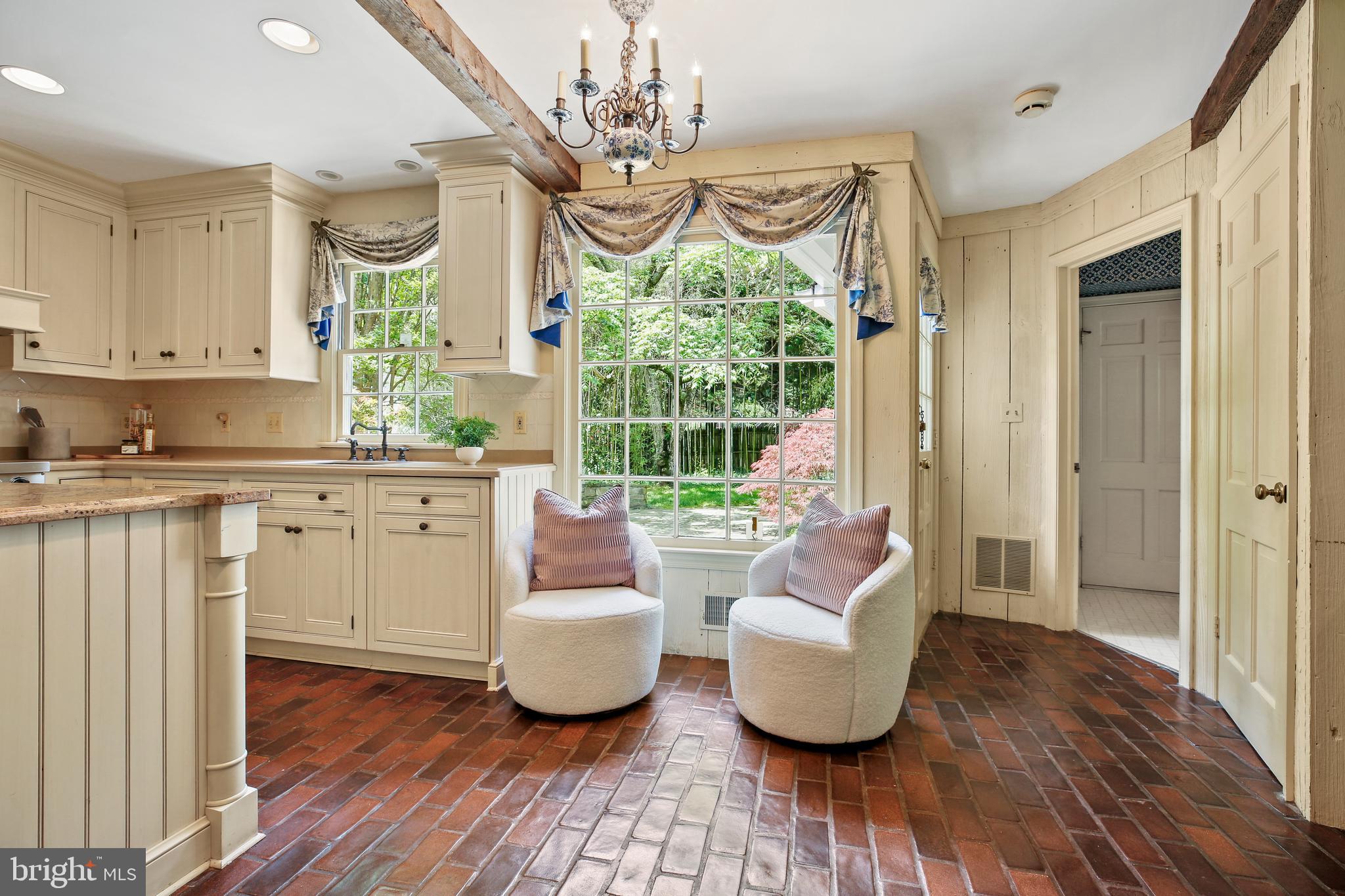 7125 Darby Road Bethesda, MD 20817 - Photo 23 of 64 a room with wooden floor and windows