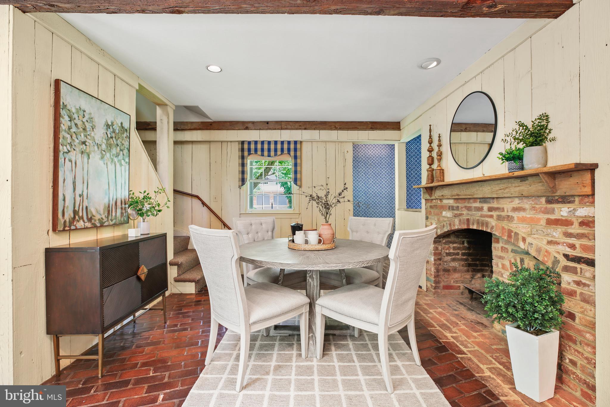 7125 Darby Road Bethesda, MD 20817 - Photo 24 of 64 a view of a dining room with furniture window and wooden floor