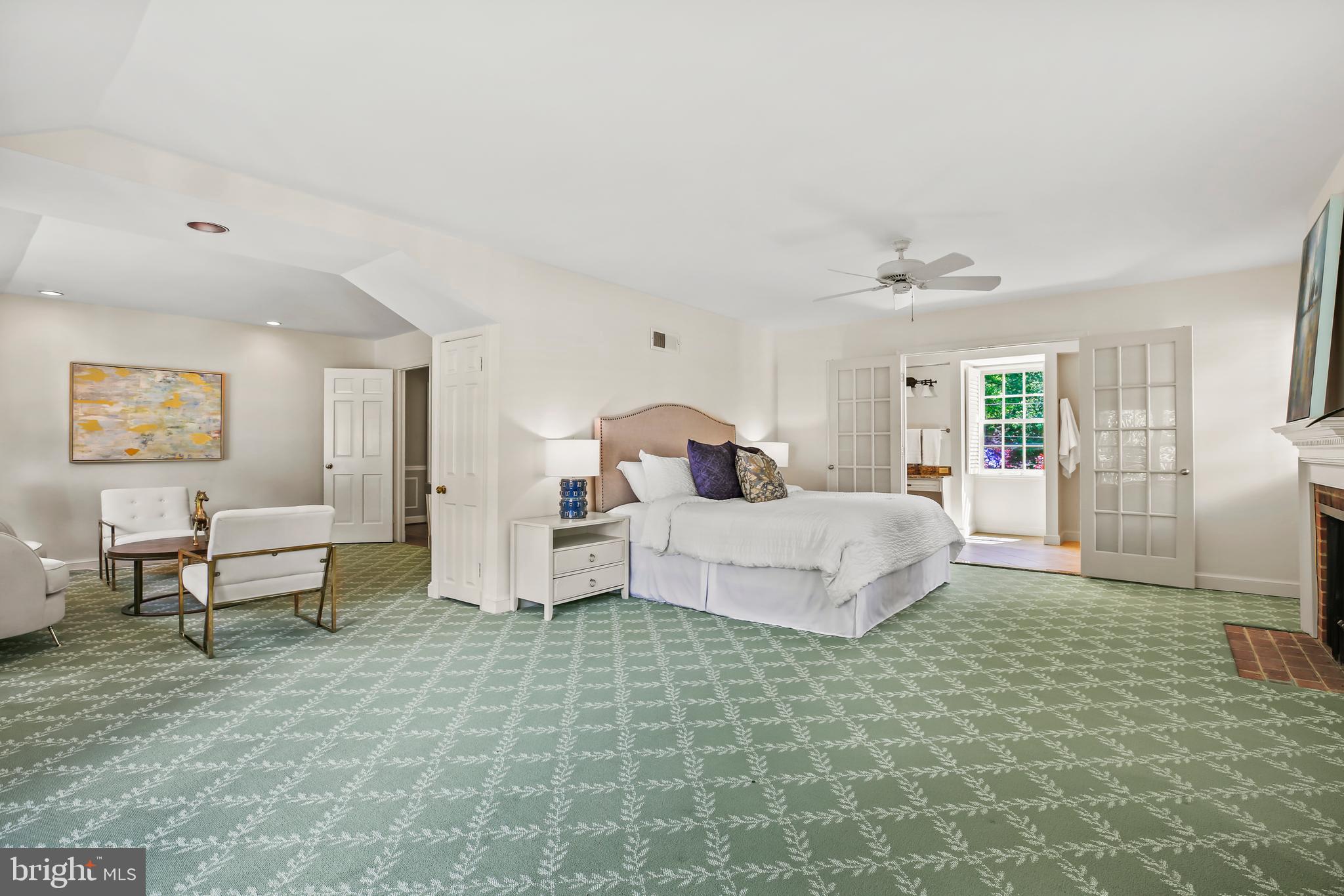 7125 Darby Road Bethesda, MD 20817 - Photo 33 of 64 a bedroom with a bed and a couch