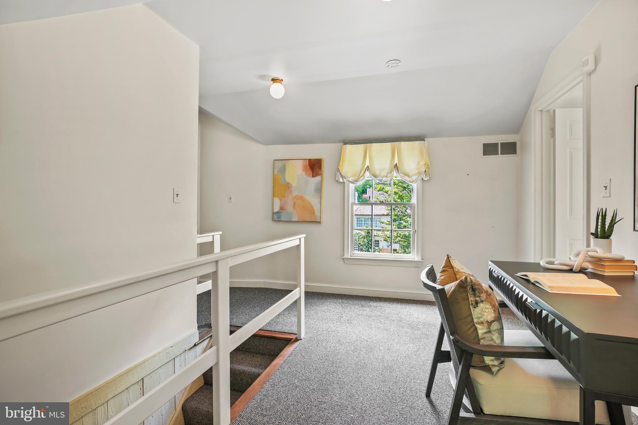 7125 Darby Road Bethesda, MD 20817 - Photo 47 of 64 a workspace with furniture and a window