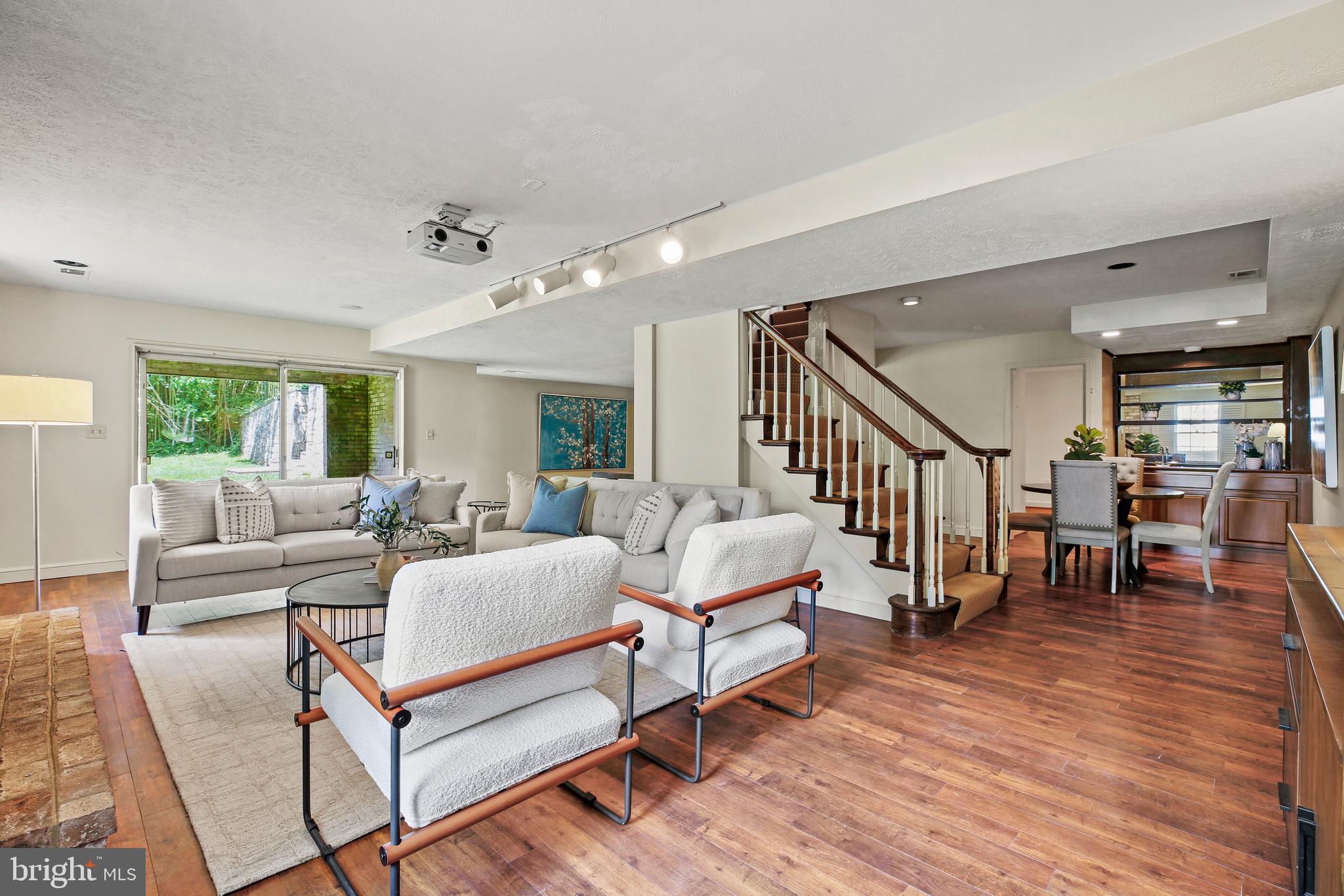 7125 Darby Road Bethesda, MD 20817 - Photo 50 of 64 a living room with furniture and wooden floor