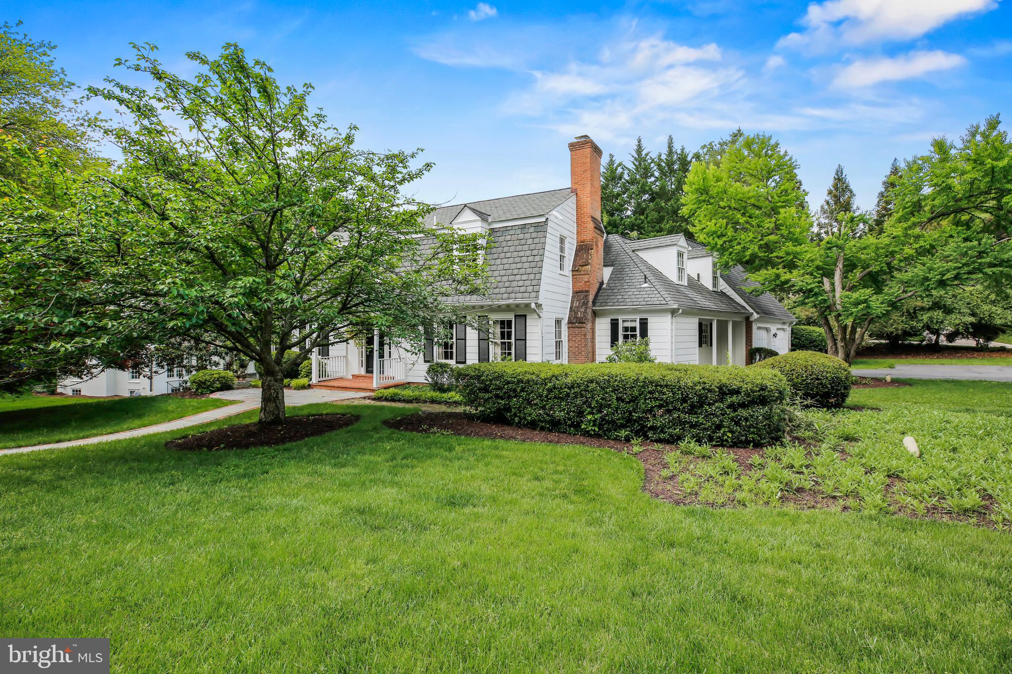 7125 Darby Road Bethesda, MD 20817 - Photo 64 of 64 a front view of a house with a yard