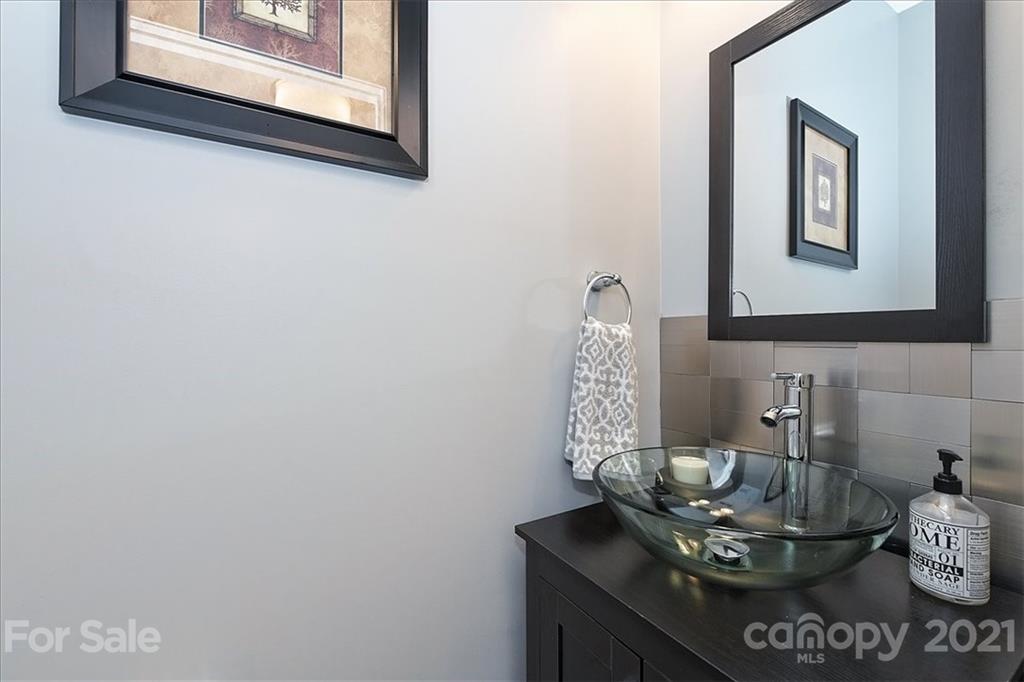 1262 Branson Road Northwest Concord, NC 28027 - Photo 18 of 34 a bathroom with a sink and a mirror