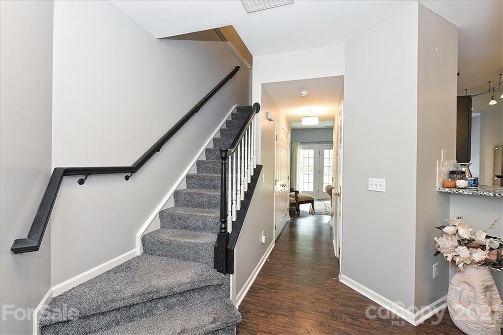 1262 Branson Road Northwest Concord, NC 28027 - Photo 4 of 34 a view of entryway and hall with wooden floor