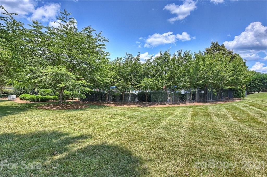 1262 Branson Road Northwest Concord, NC 28027 - Photo 34 of 34 a view of a yard with a house in the background