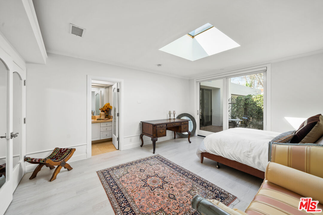 23318 Park Colombo Calabasas, CA 91302 - Photo 23 of 36 a living room with furniture and a rug