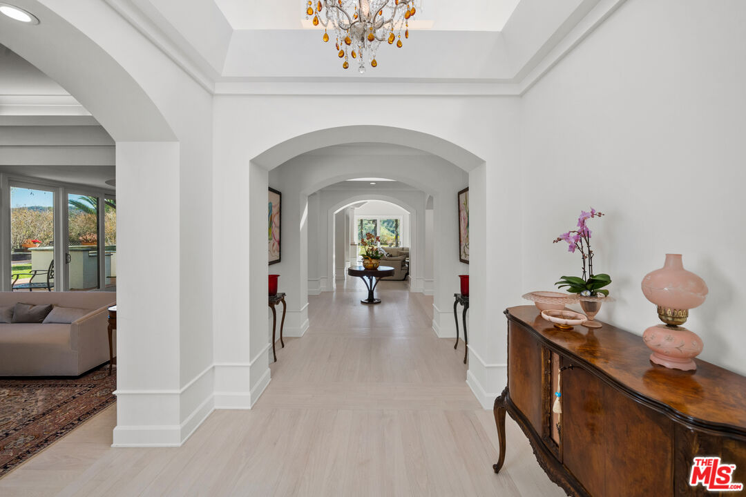 23318 Park Colombo Calabasas, CA 91302 - Photo 3 of 36 a view of a livingroom with furniture and wooden floor