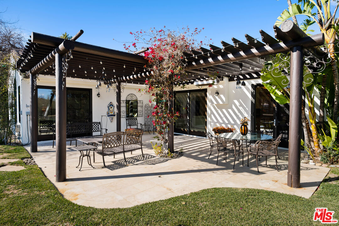 23318 Park Colombo Calabasas, CA 91302 - Photo 31 of 36 a view of a house with porch and furniture