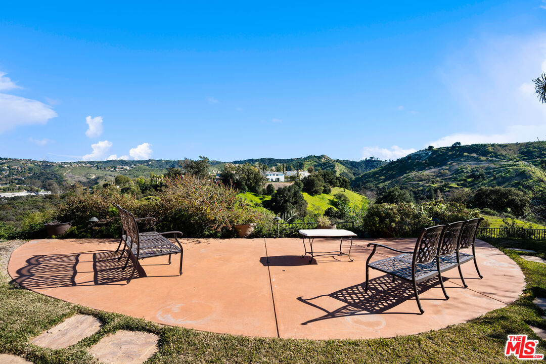 23318 Park Colombo Calabasas, CA 91302 - Photo 34 of 36 a view of a swimming pool with a patio