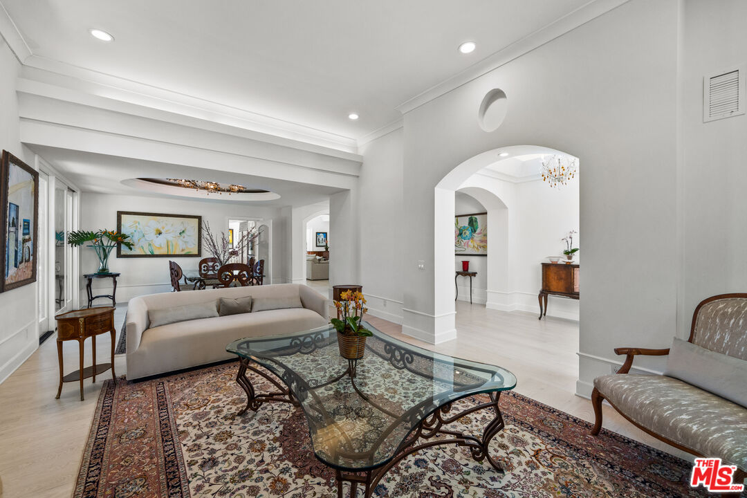 23318 Park Colombo Calabasas, CA 91302 - Photo 7 of 36 a living room with furniture and wooden floor