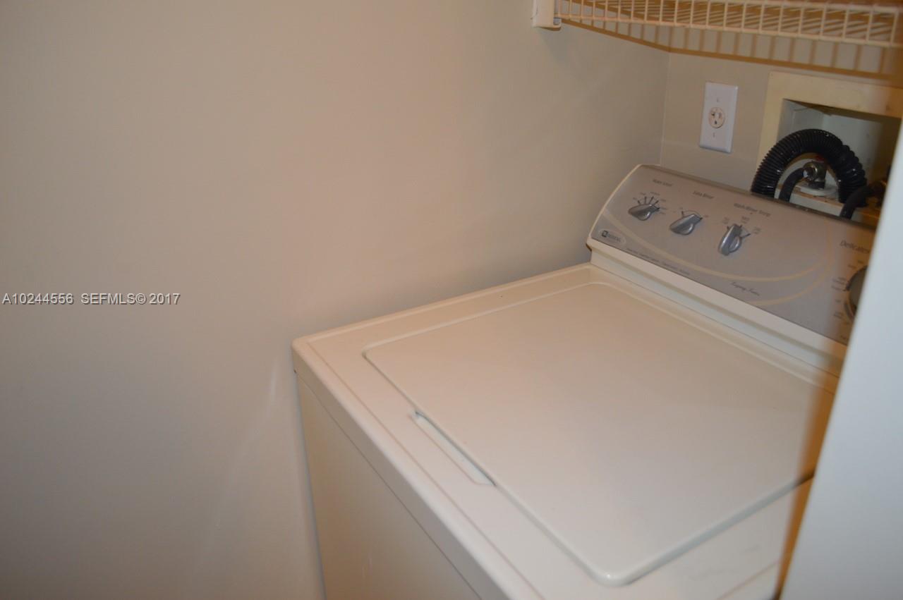 2011 Renaissance Boulevard, Unit 201 Miramar, FL 33025 - Photo 11 of 22 a close up view of washer and dryer