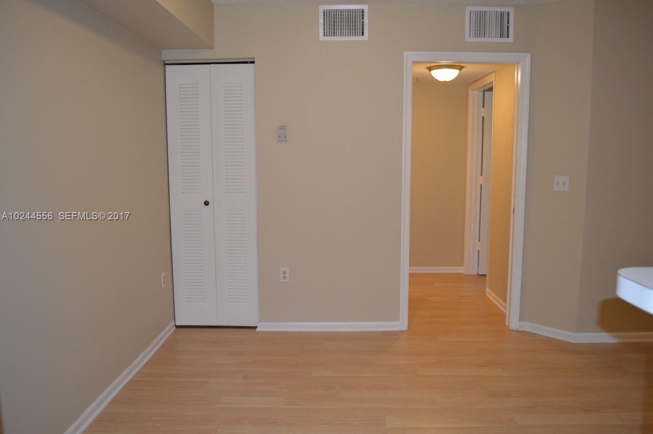2011 Renaissance Boulevard, Unit 201 Miramar, FL 33025 - Photo 12 of 22 a view of an empty room