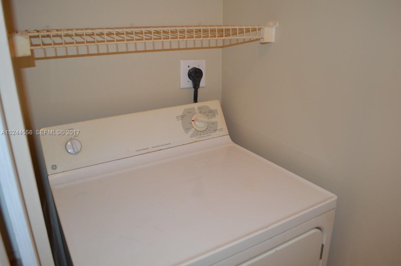 2011 Renaissance Boulevard, Unit 201 Miramar, FL 33025 - Photo 10 of 22 a close up view of washer and dryer