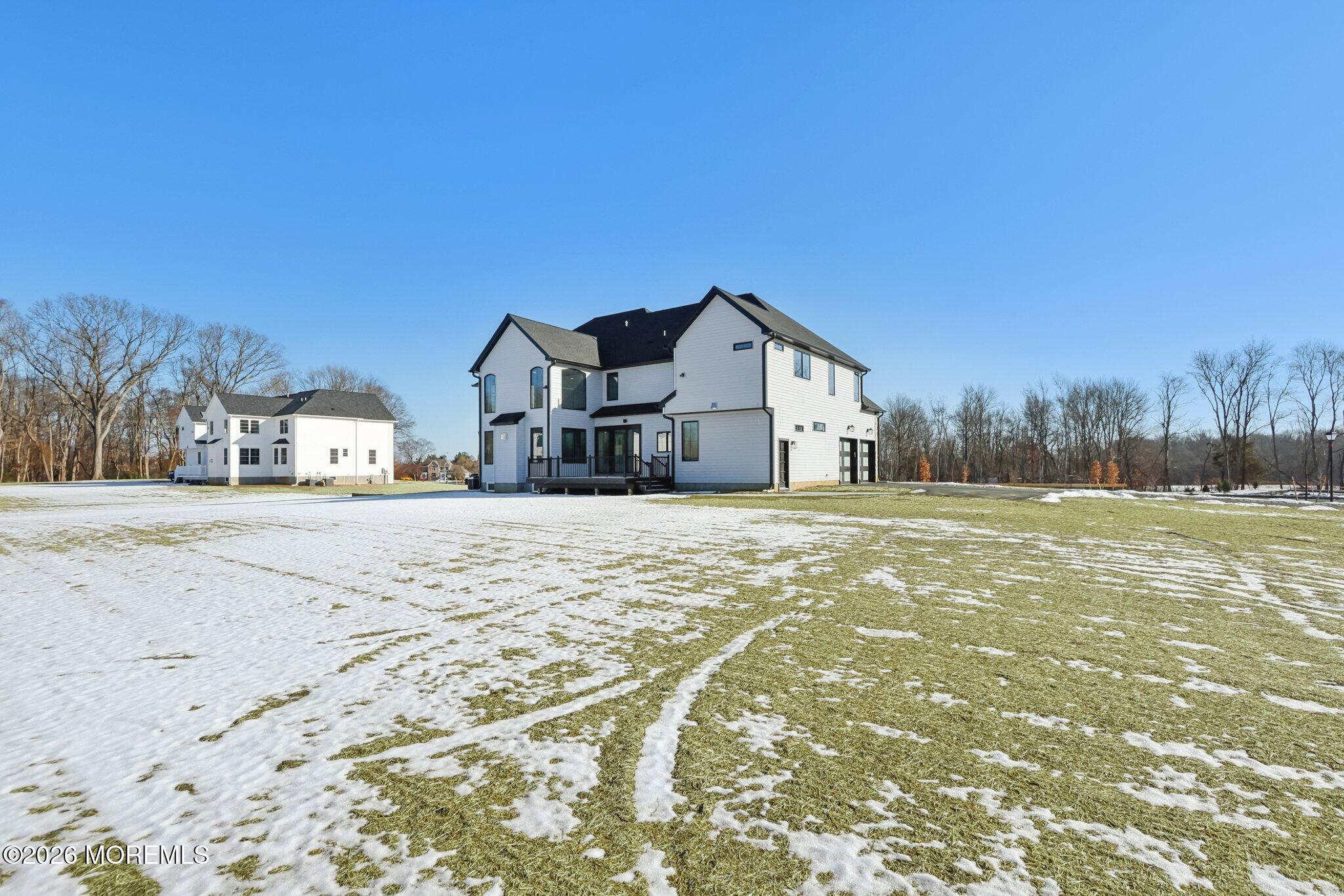 8 Hague Road Freehold, NJ 07728 - Photo 7 of 13 a view of house with a yard