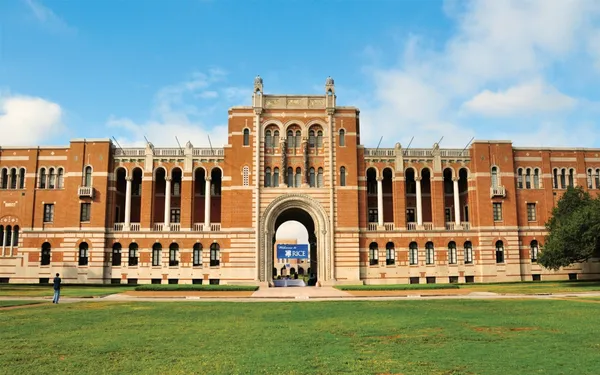 a large building with a view of a big yard
