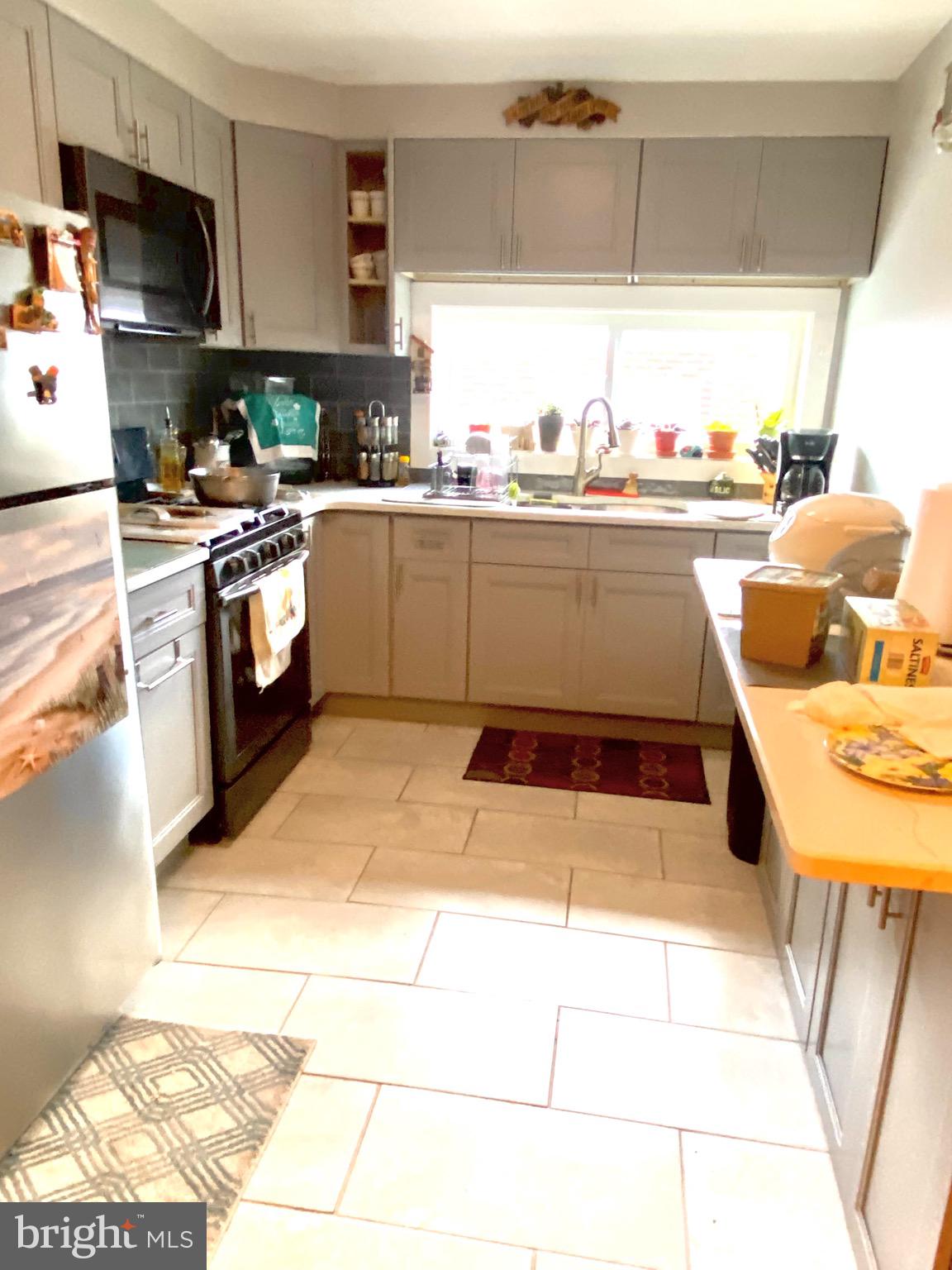 8908 Blue Grass Road Philadelphia, PA 19152 - Photo 8 of 24 Kitchen with lights off