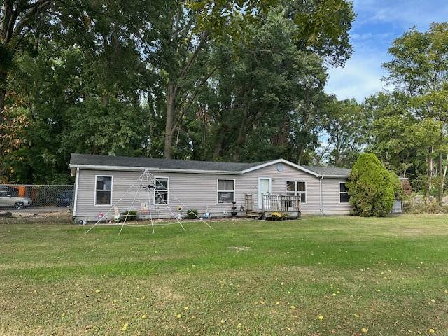 1198 Old Porter Road Porter, IN 46304 - Photo 2 of 22 a front view of house with yard and green space