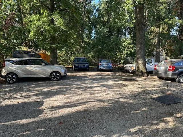 a view of street with parked cars