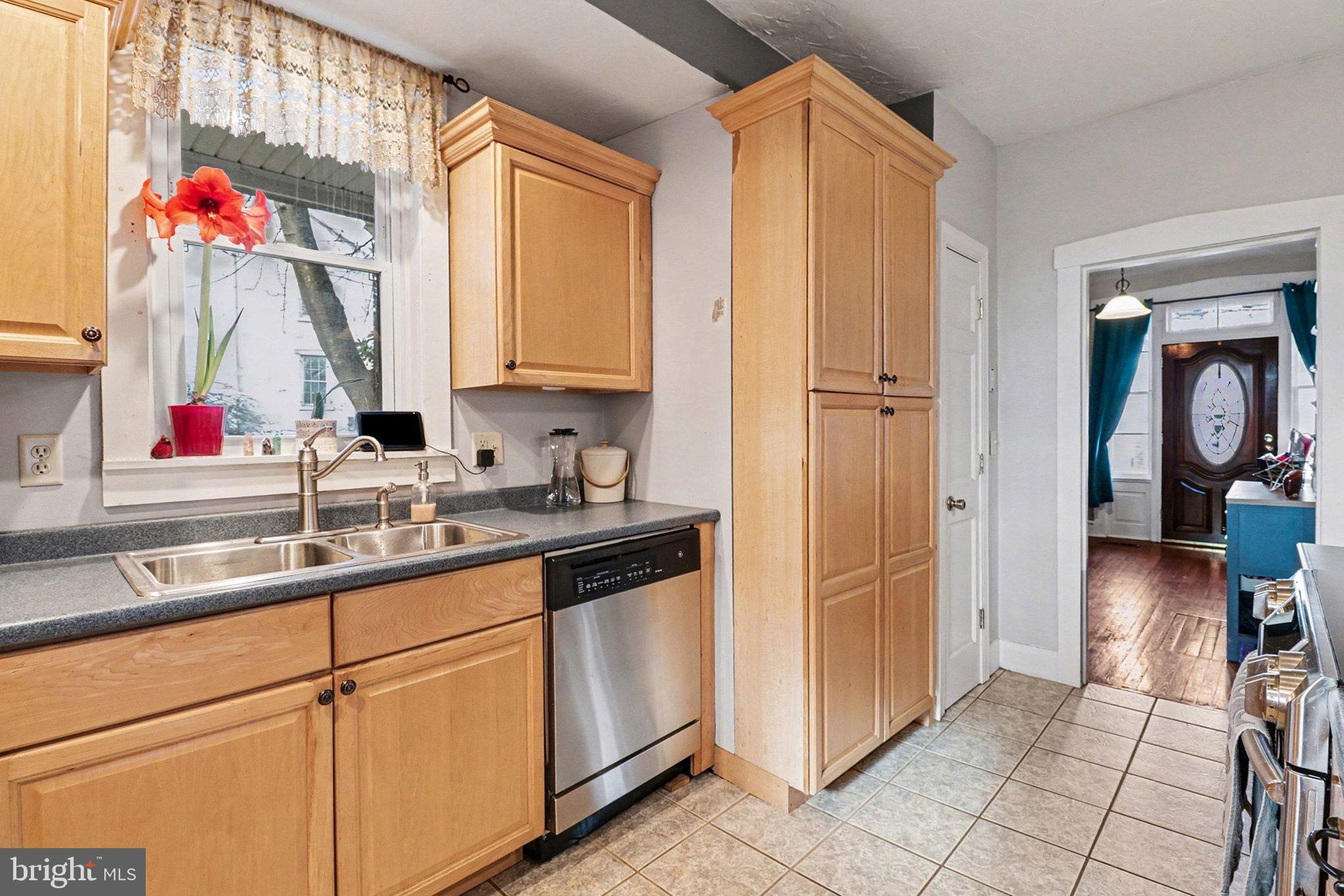 153 East Main Street Biglerville, PA 17307 - Photo 13 of 39 a kitchen with a sink cabinets and utility room