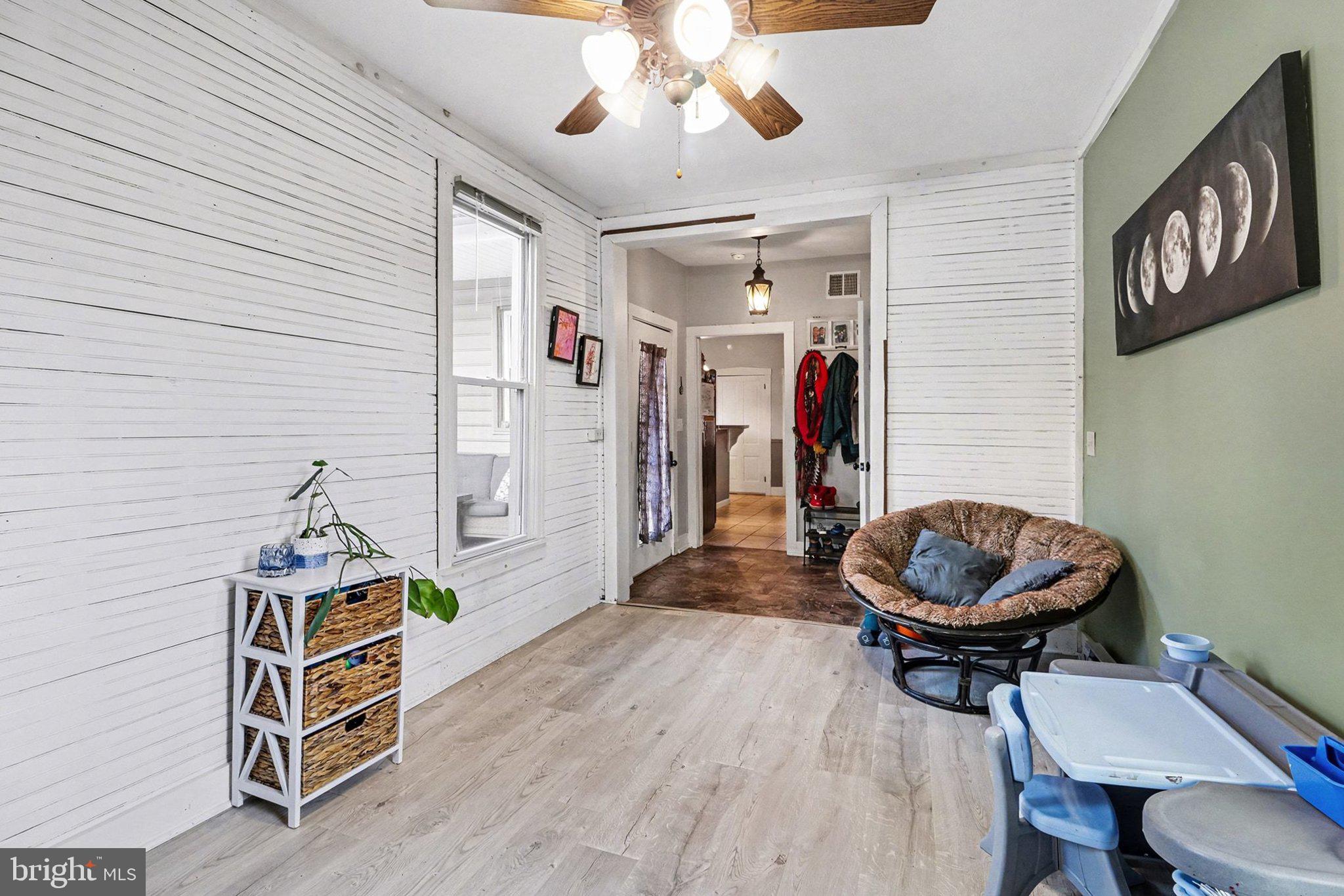 153 East Main Street Biglerville, PA 17307 - Photo 17 of 39 a room with furniture and wooden floor