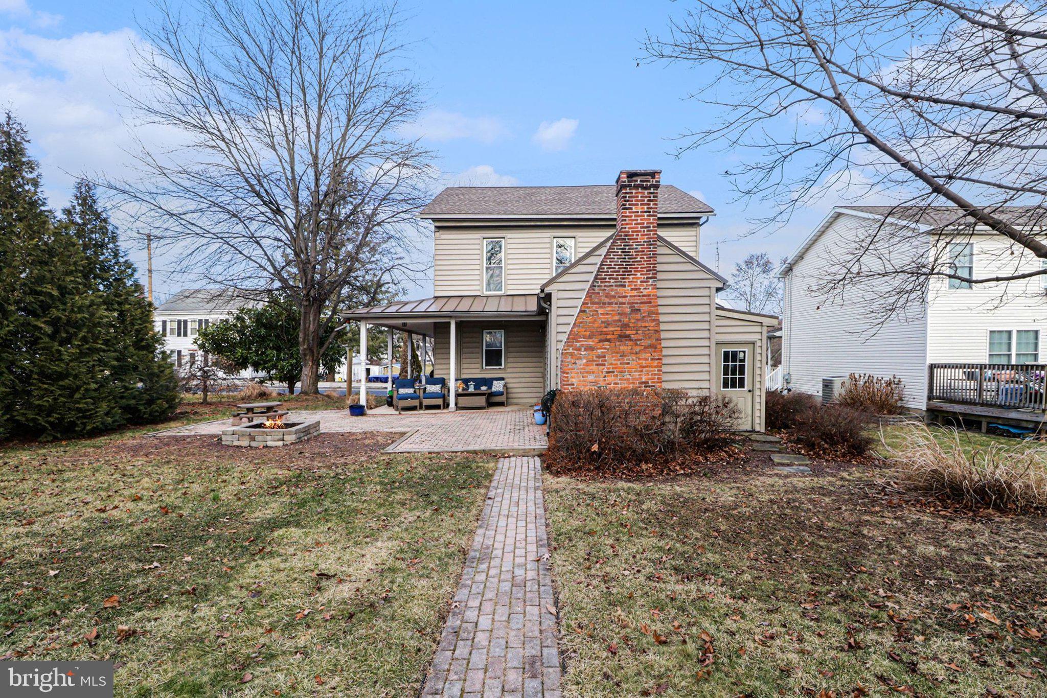 153 East Main Street Biglerville, PA 17307 - Photo 34 of 39 a view of a house with a yard covered in snow