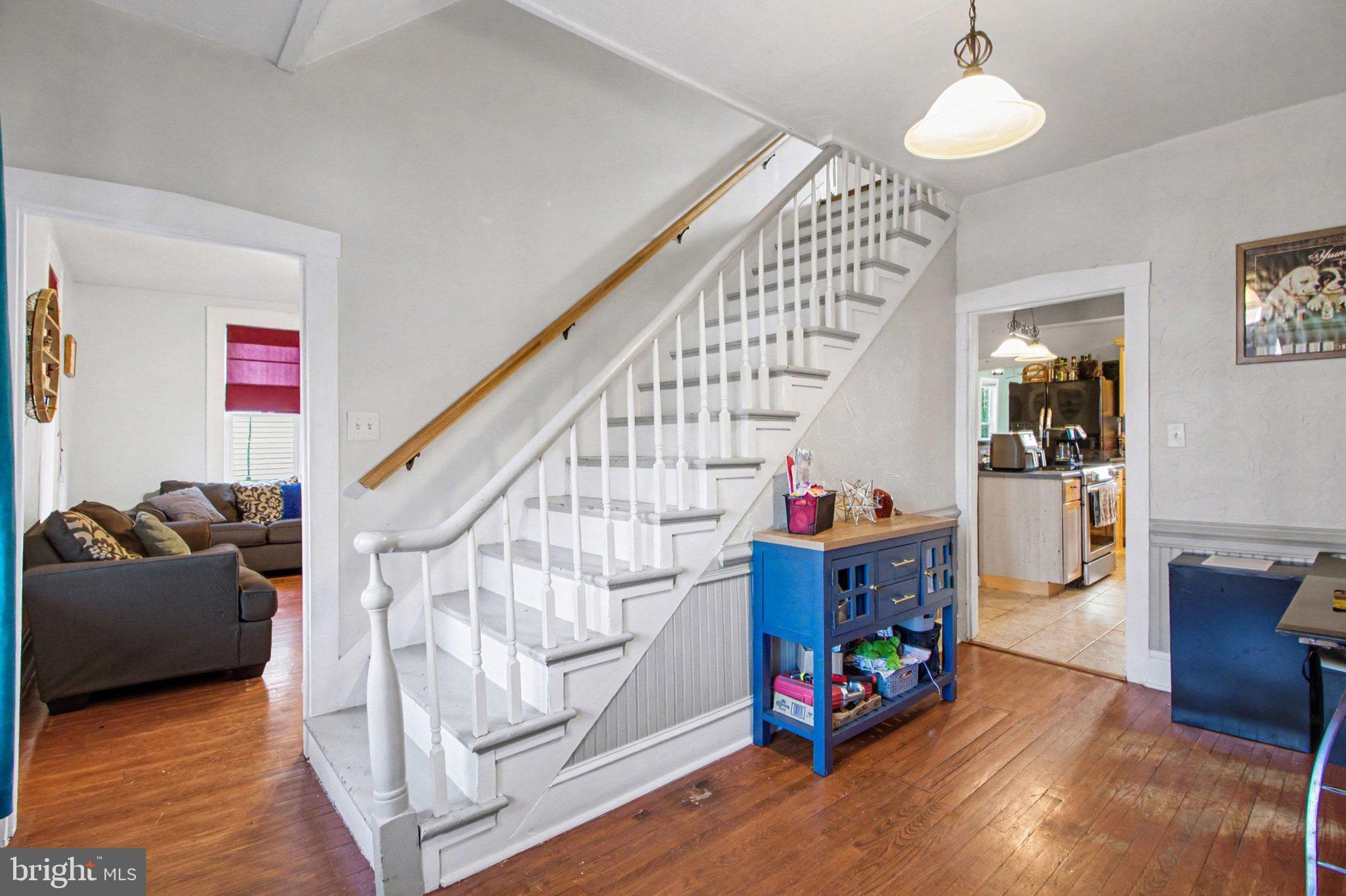 153 East Main Street Biglerville, PA 17307 - Photo 5 of 39 a living room with wooden floor and furniture
