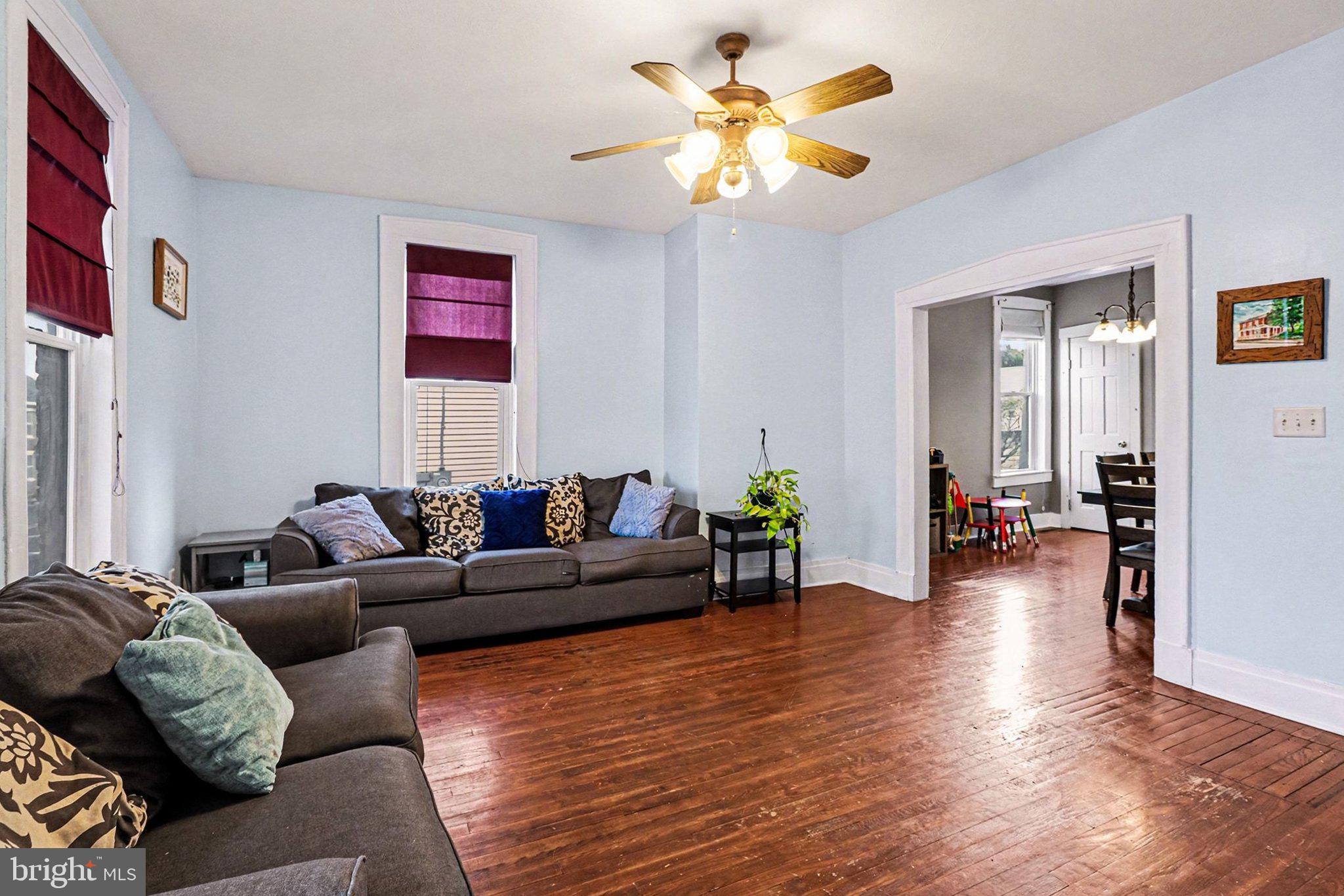 153 East Main Street Biglerville, PA 17307 - Photo 6 of 39 a living room with furniture and a wooden floor