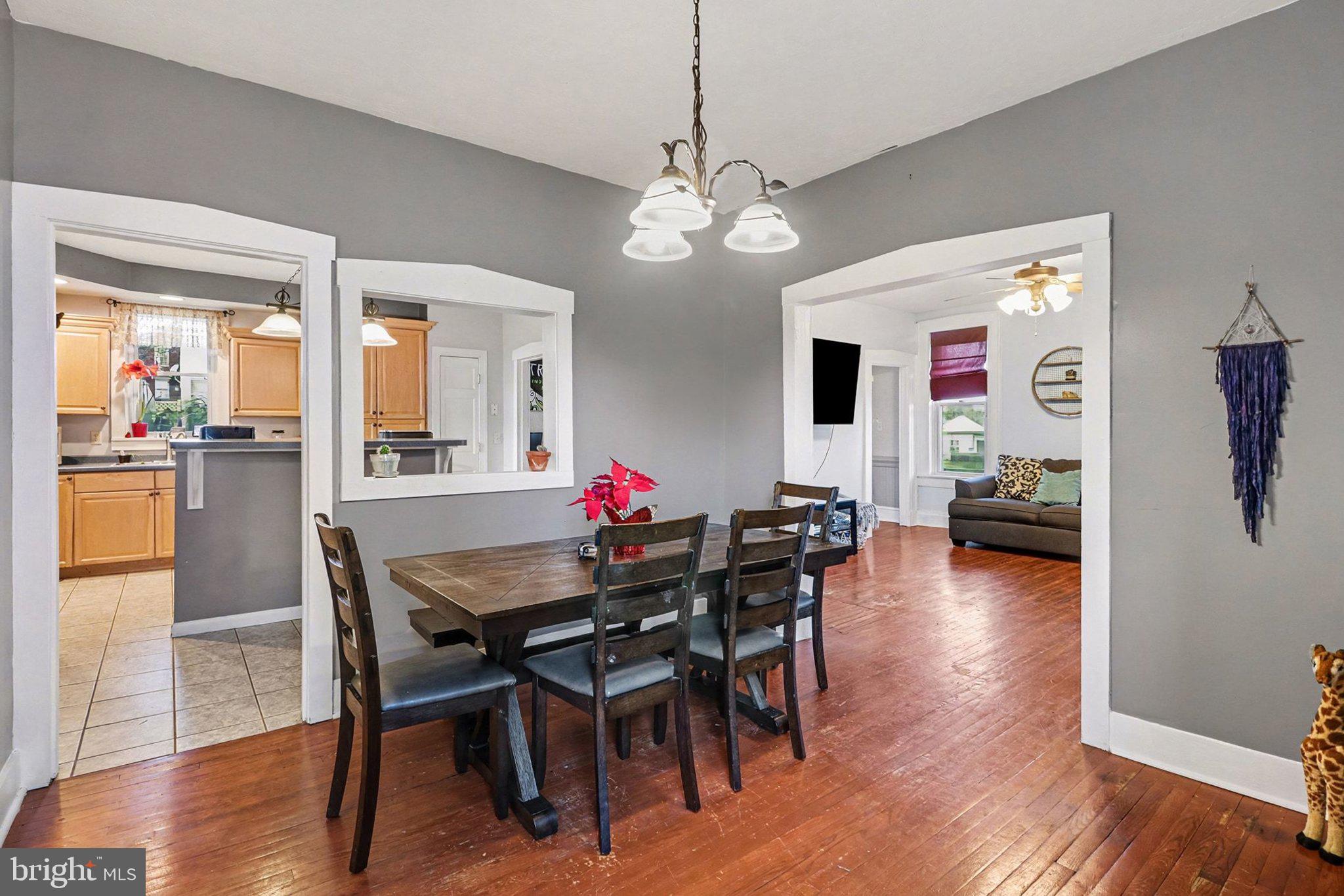 153 East Main Street Biglerville, PA 17307 - Photo 10 of 39 a view of a dining room with furniture and wooden floor