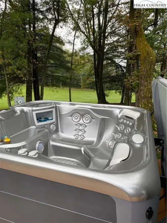 a view of a table and chairs in a swing