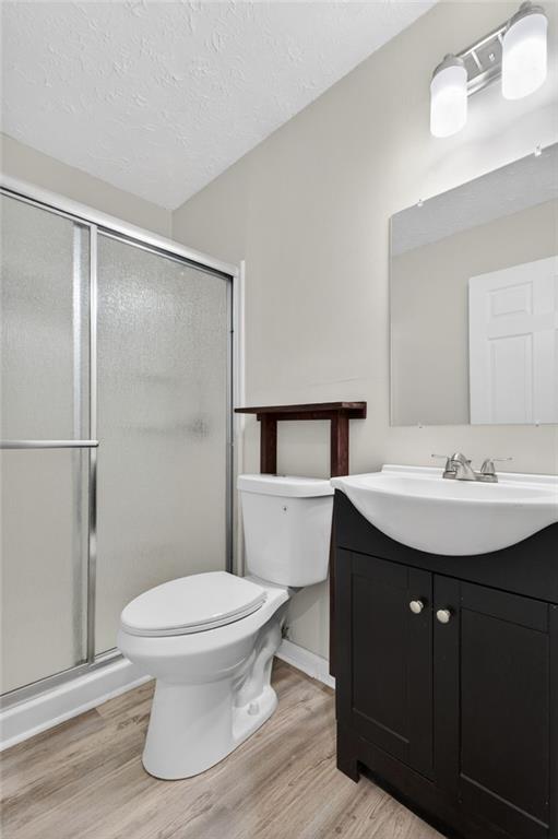 7630 Rico Road Palmetto, GA 30268 - Photo 32 of 53 a bathroom with a sink toilet and shower