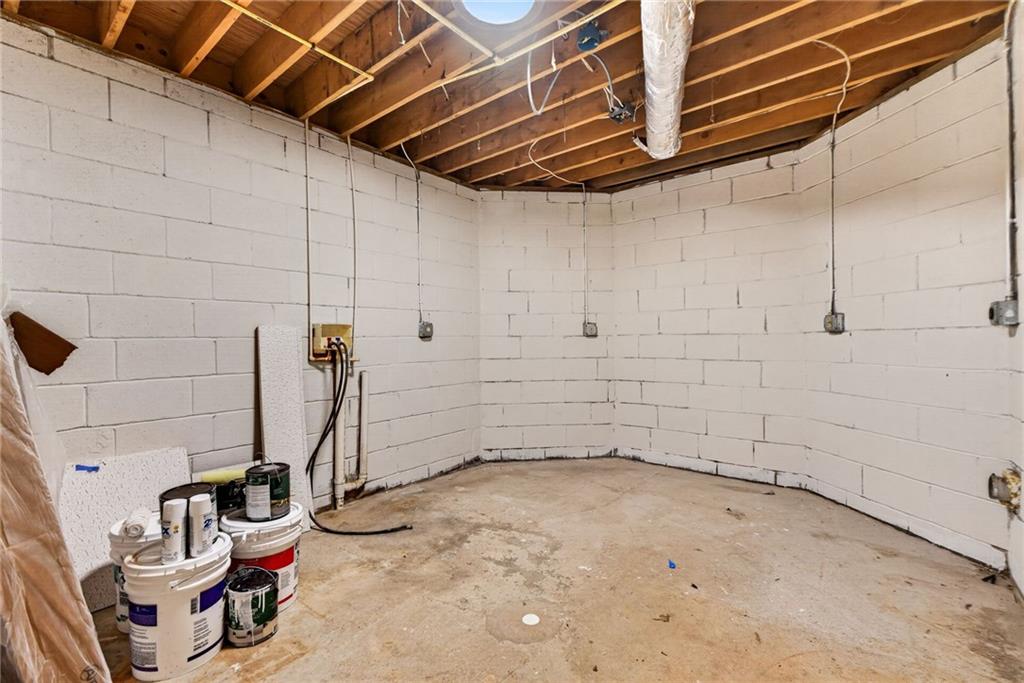 7630 Rico Road Palmetto, GA 30268 - Photo 40 of 53 a view of a room with storage and utility room