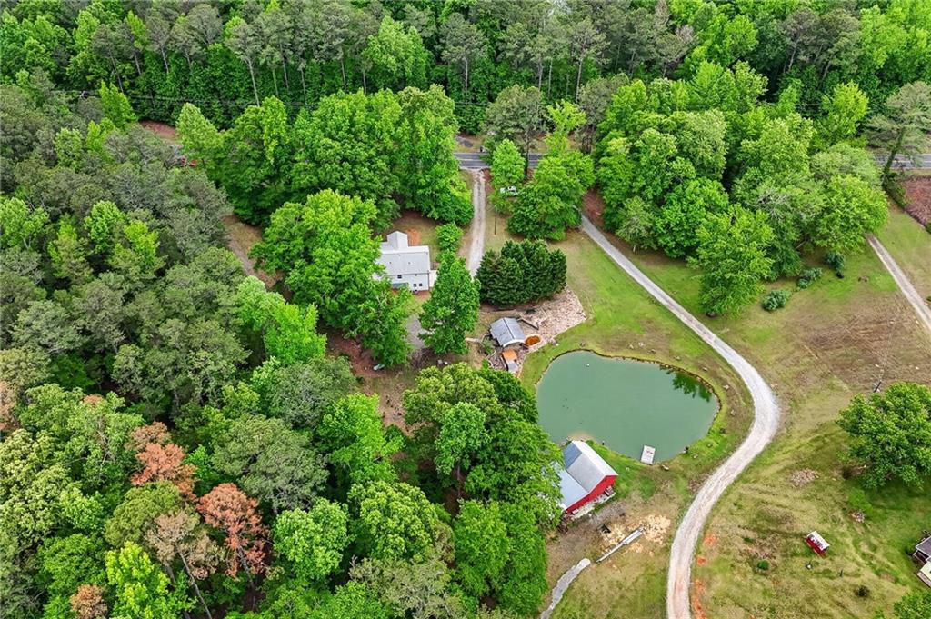 7630 Rico Road Palmetto, GA 30268 - Photo 49 of 53 an aerial view of house with outdoor space