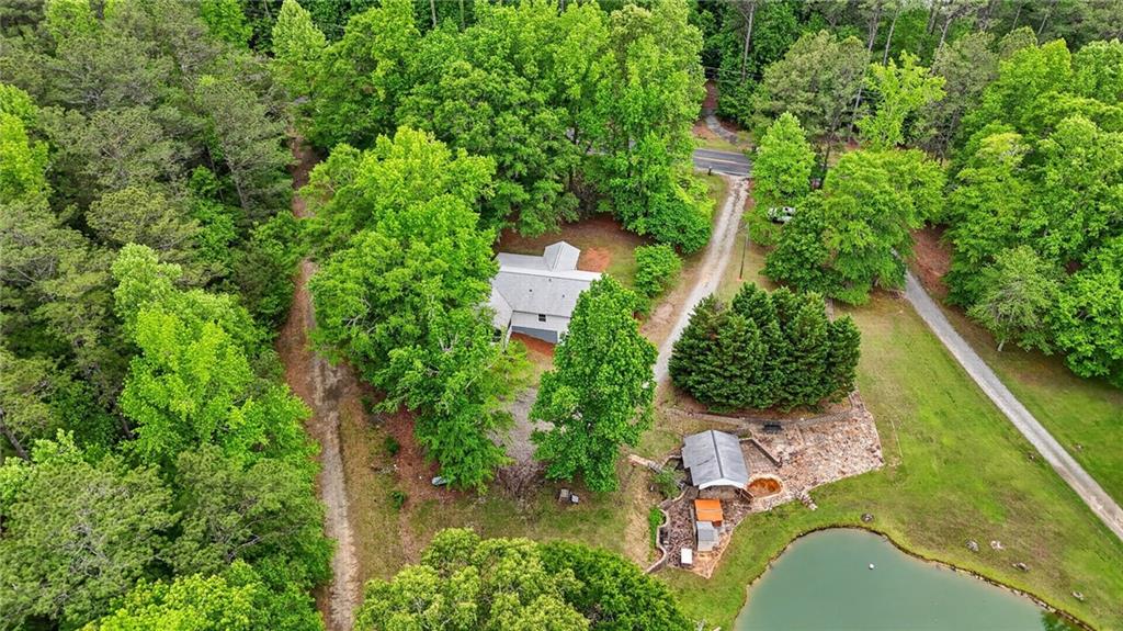 7630 Rico Road Palmetto, GA 30268 - Photo 50 of 53 an aerial view of a house with a yard and outdoor seating