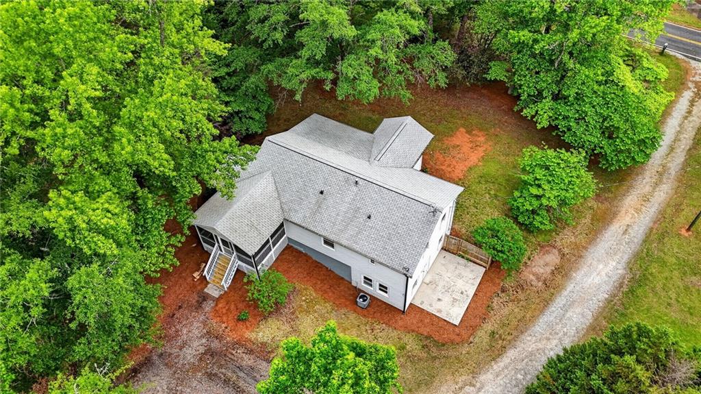 7630 Rico Road Palmetto, GA 30268 - Photo 51 of 53 an aerial view of a house with garden space and street view