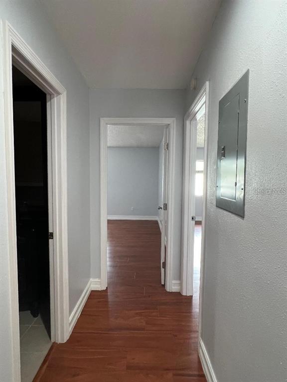 157 Springwood Circle, Unit C Longwood, FL 32750 - Photo 12 of 26 a view of a hallway with wooden floor